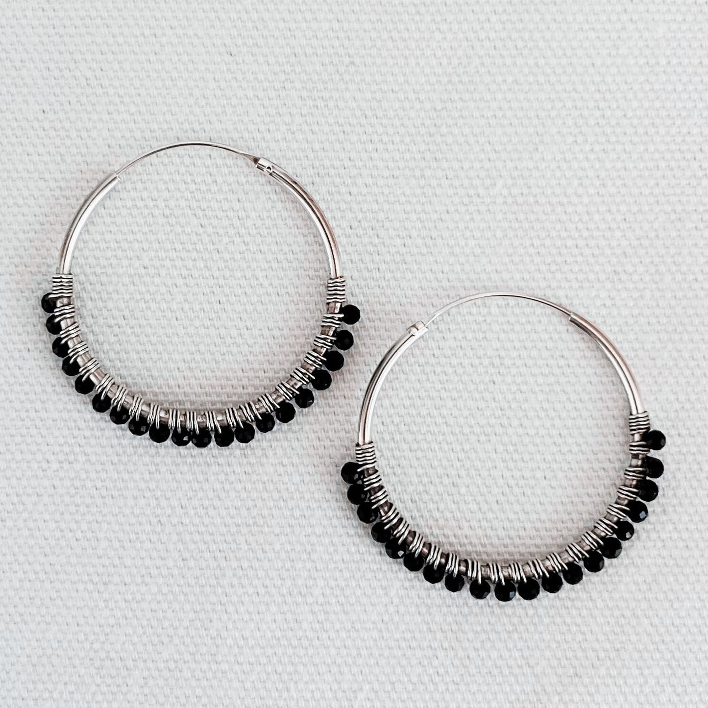 Bohemian boho chic Indriya hoops made of sterling silver and black agate gemstones