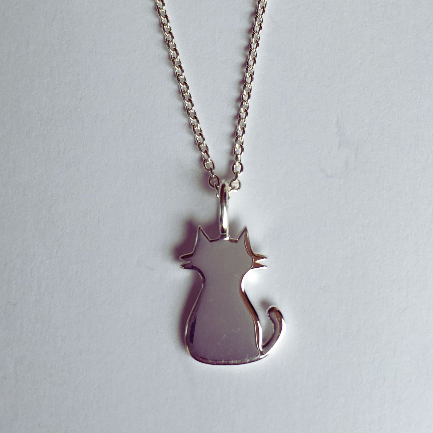 Sterling silver boho chic pendant featuring a cat 