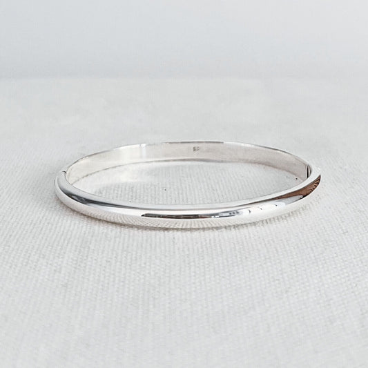 Half round profile hinged bangle beautifully crafted from genuine sterling silver