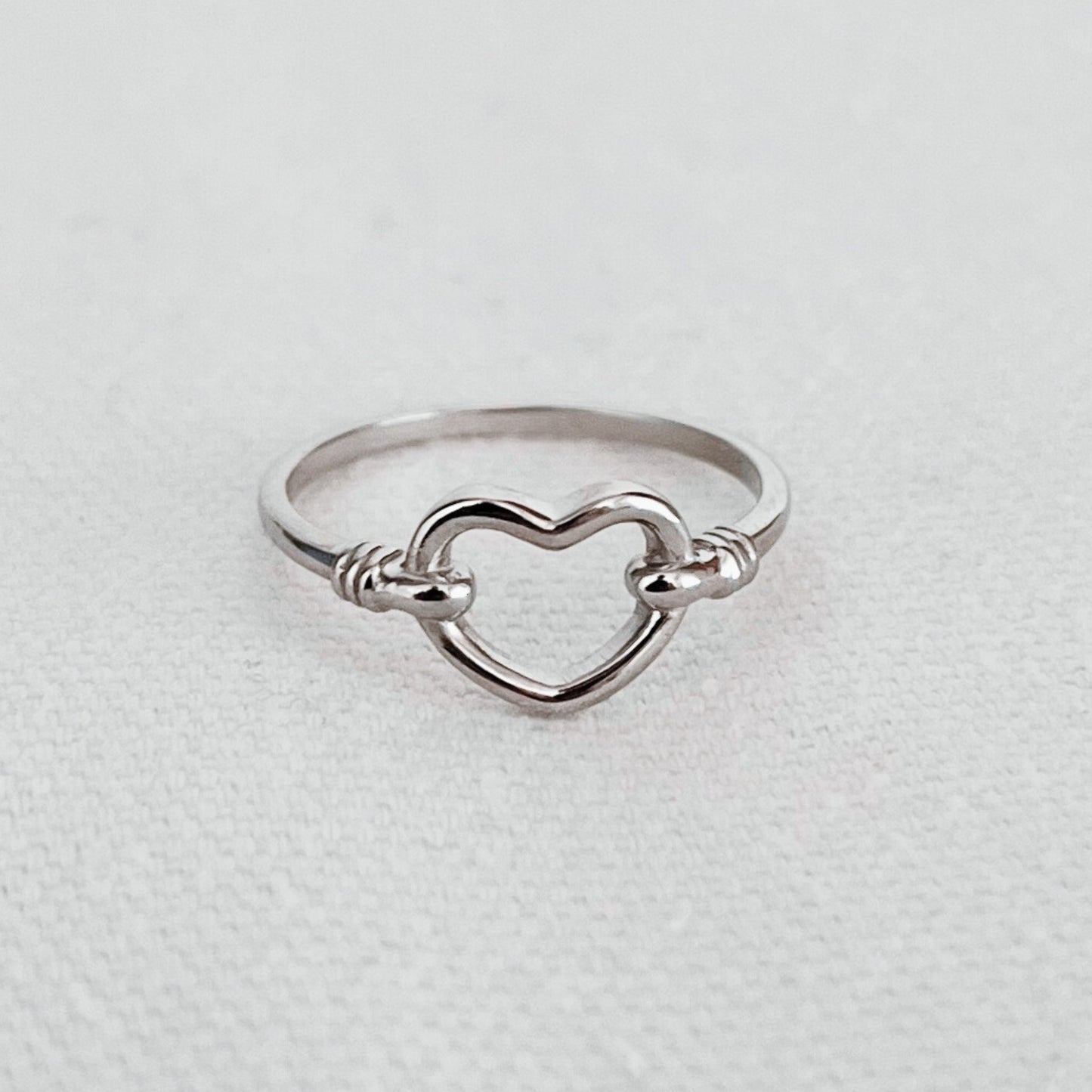 Delicate sterling silver boho chic stackable heart ring featuring a gorgeous heart design