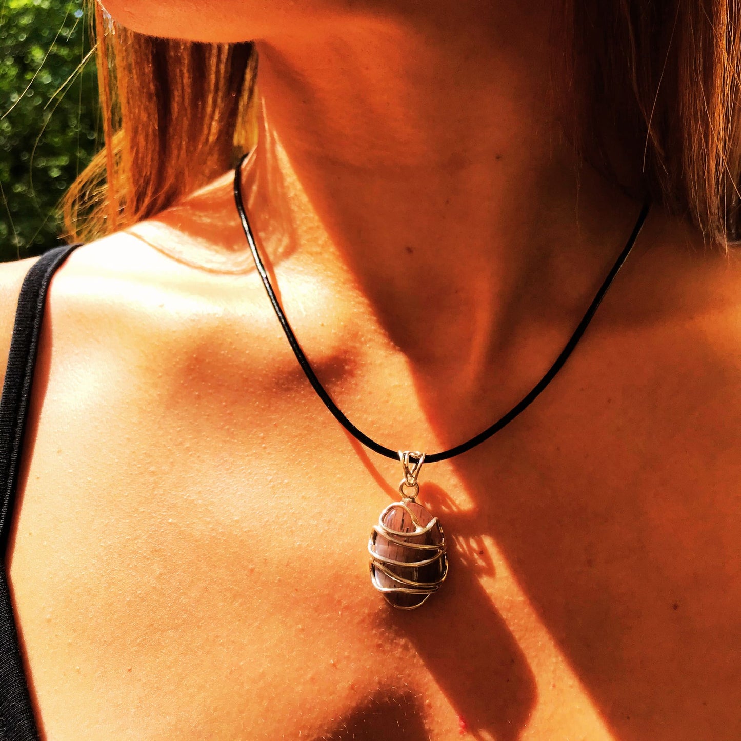 Model wearing Australian Lattice boho chic Boora pendant featuring a Fuchsite gemstone in wires of sterling silver